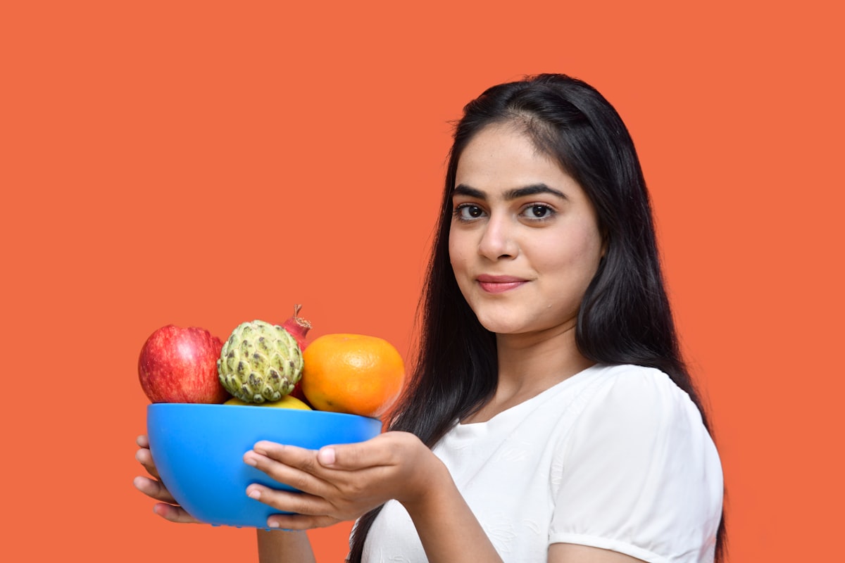 Woman preparing healthy meal with fresh vegetables